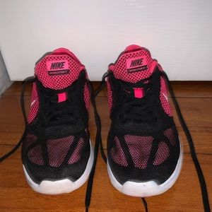 NIKE pink and black running shoes